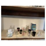 SHOT GLASSES AND LOWENBRAU MUG YUKON JACK