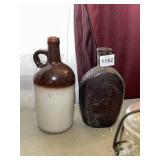 BROWN GLASS HOUSE BOTTLE AND JUG