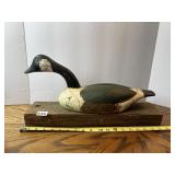 CARVED WOODEN GOOSE, SIGNED CB ON RUSTIC WOOD