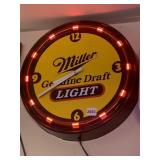 MILLER GENUINE DRAFT LIGHT , CLOCK LIGHTS UP ON