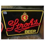 ILLUMINATED BACK WINDOW ADVERTISING FOR STROHï¿½S