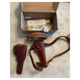 PAIR OF LEATHER HOLSTERS & GUN LOCKS