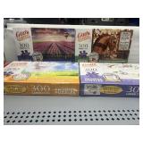 4 NEW PUZZLES 300 PC.