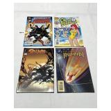4 COMICS LIKE NEW CONDITION SEE PHOTO