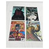 4 COMICS LIKE NEW CONDITION SEE PHOTO