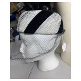 BLACK AND WHITE HAT AND RED STRAW HAT