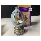 MUSICAL DECORATIVE EGG WITH CAROUSEL HORSE WITH