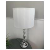 TABLE LAMP WITH WHITE FABRIC DRUM SHADE AND