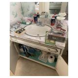 CONTENTS OF CABINET ON AND UNDER VANITY