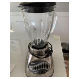 OSTER BRAND BLENDER WITH CHROME AND BLACK PLASTIC