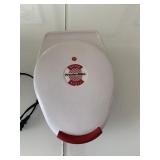 WHITE PLASTIC ELECTRIC GRIDDLE WITH RED HANDLES