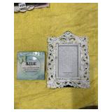 WHITE-PAINTED ORNATE PICTURE FRAME WITH