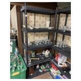 BLACK PLASTIC STORAGE SHELF MUST COME TOWARDS END