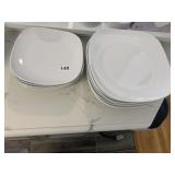COLLECTION OF WHITE CERAMIC SQUARE PLATES WITH