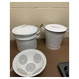 THREE GREY ENAMELWARE OR METAL VESSELS WITH WHITE