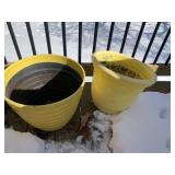 TWO YELLOW PLASTIC PLANTERS