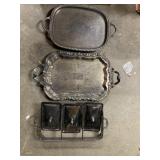 THREE SILVER-PLATED SERVING TRAYS WITH ORNATE
