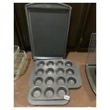 THREE NON-STICK METAL MUFFIN PANS IN GRAY FINISH,