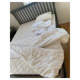 WHITE QUILTED TEXTILE BEDDING ENSEMBLE COMPRISING