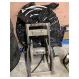 BEIGE AND GRAY PLASTIC AIR COMPRESSOR UNIT WITH