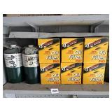 SIX OIL FILTERS , SIX PROPANE TANKS FOR GRILL,