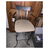 IRON FRAME BAR STOOL WITH TAN COLORED UPHOLSTERED