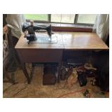 UNIVERSAL SEWING MACHINE W/ CABINET.