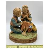 POLYRESIN STATUETTE DEPICTING BOY AND GIRL, FIRST
