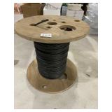 WOODEN SPOOL W/ #8 BLACK ELECTRICAL WIRE.