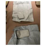 GREY & TAN PROTECTIVE UTILITY COVERS.