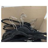 40PC BLACK VELVET HANGERS W/ CHROME HOOKS.