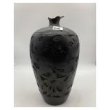 BLACK ORNATE FLORAL PIERCED CARVED VASE.