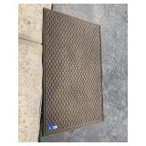 BROWN RUBBER TEXTURED DOORMAT.