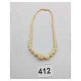 CARVED ROSE BEAD NECKLACE POSSIBLY BONE