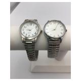 TWO SILVER TONE WRISTWATCHES STRETCH BANDS