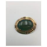 VINTAGE PIN OVAL GOLD TONE WITH GREEN STONE