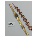 BILL BLASS WRISTWATCH GOLD TONE COPPER MEDALLION