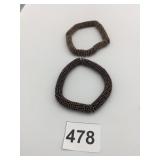 TWO VINTAGE METAL BRACELETS STAR SHAPE DISCS