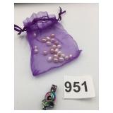 SMALL MESH BAG OF PINK AND WHITE OVAL BEADS NO