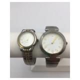 TWO SILVER TONE WRISTWATCHES STRETCH BANDS