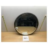 ROUND METAL FRAMED MIRROR, EMBOSSED BORDER.