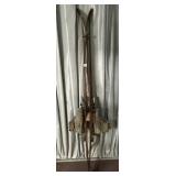 VINTAGE WOODEN SKIS W/ ATTACHED LEATHER BOOTS AND