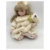 PORCELAIN DOLL W/ BLONDE HAIR, BLUE EYES, CREAM