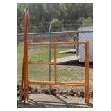 ORANGE PAINTED METAL SCAFFOLDING COMPONENTS,