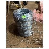 LARGE COIL OF BLUE AND WHITE STRIPED INSULATED