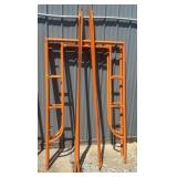 ORANGE METAL SCAFFOLDING FRAMES, CROSS BRACES.
