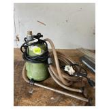 GREEN UTILITY WATER PUMP W/ HOSES AND METAL PIPE.