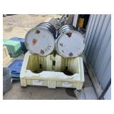 POLY RACKER DRUM CONTAINMENT UNIT W/ METAL DRUMS.