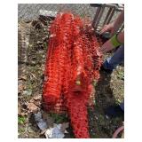 ORANGE PLASTIC SAFETY FENCING ROLLS.
