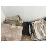 ASSORTED CANVAS TARPS, FOLDED HEAVY DUTY COVERS.